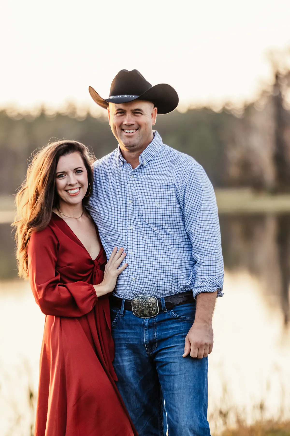 Jill and Jeremy Barton at golden hour on the ranch